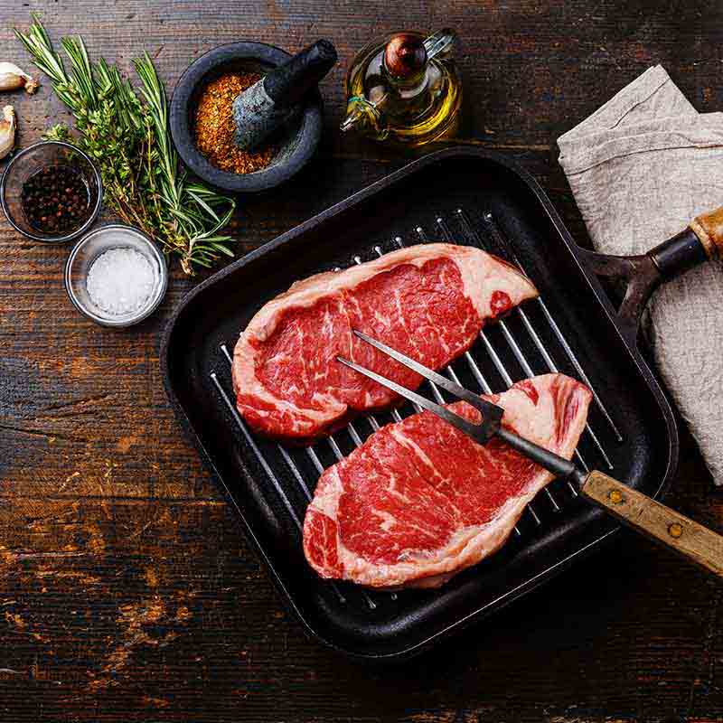 Christensen Ranch NY Steak Strips On Grill - Pasture Raised Beef