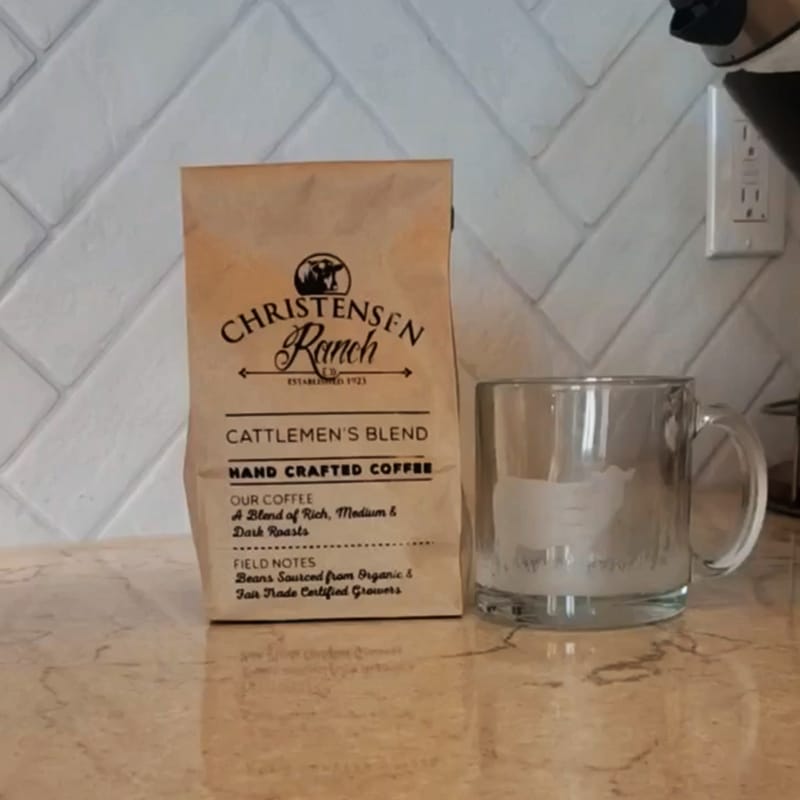 glass coffee mug with bag of coffee
