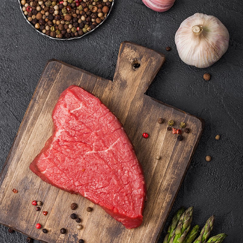 sirloin tip steak on cutting board