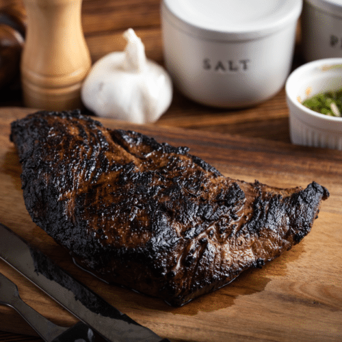 Smoked tri tip on cutting board for 4th of July BBQ