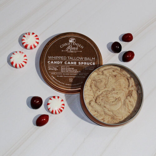 Tin of Christensen Ranch holiday-edition Candy Cane Spruce whipped tallow balm